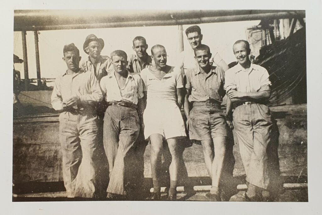 Taken aboard the SS Destro in September 1941, this shows Owen Brewer, centre back, Bill Kerr, centre front, and Frank Brewer, second from right, on the final leg of the escape.