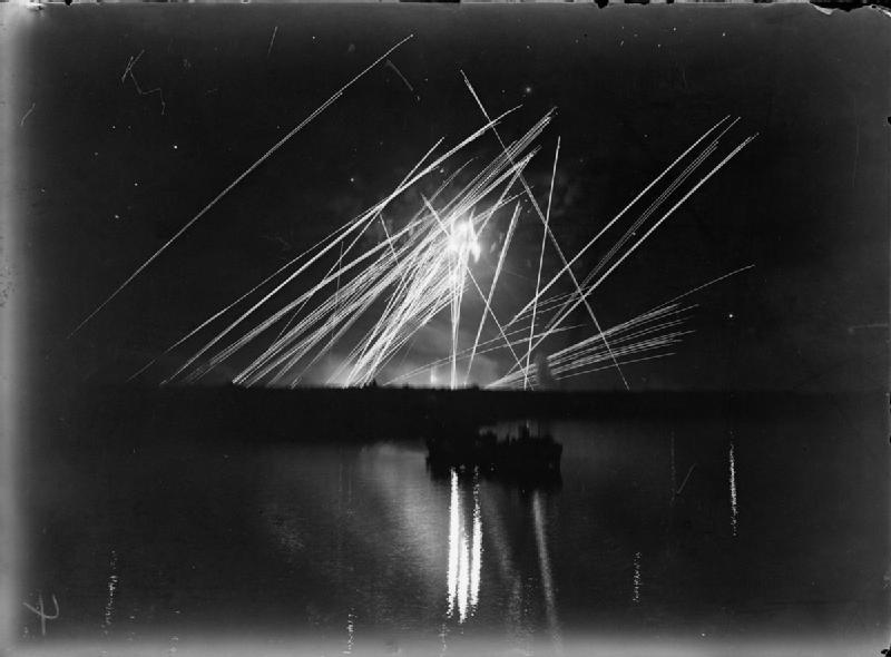 anti-aircraft guns light up the sky during the Siege of Malta.