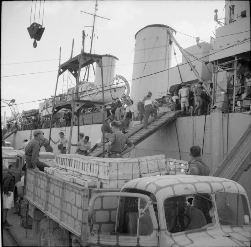 A convoy is unloaded in Malta.